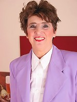 This classy housewife plays with her pussy