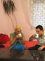 She looks up at him and sucks his cock before he enters her mature pussy with power